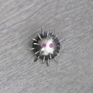 Silver Pin "Kratt" with Rhodolites