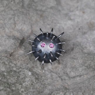 Silver Pin "Kratt" with Rhodolites