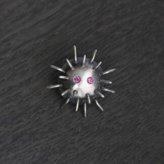 Silver Pin "Kratt" with Rhodolites